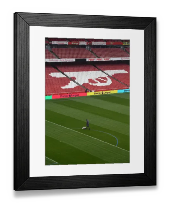 Framed Print : Arsenal Groundstaff Prepare Blue Turf for Premier League Match Framed Print : Arsenal Groundstaff Prepare Blue Turf for Premier League Match