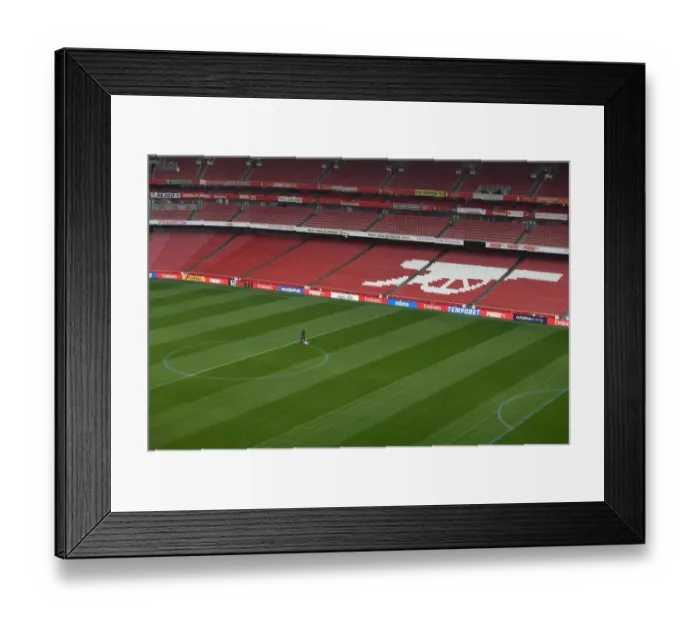 Framed Print : Arsenal Groundstaff Prepare Blue Turf for Arsenal vs. Manchester City (2017-18)