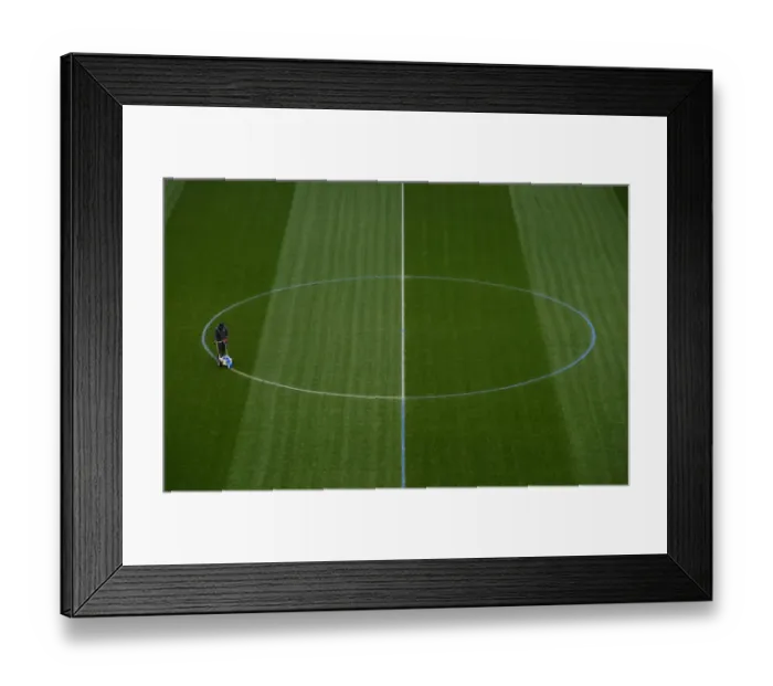 Framed Print : Arsenal Groundstaff Prepare Blue Turf for Arsenal vs Manchester City (2017-18)