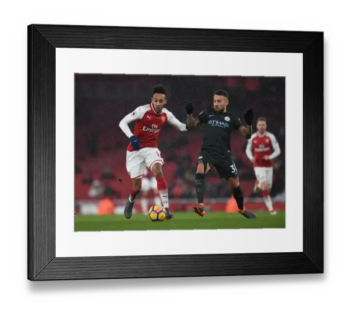 Framed Print : Clash of Titans: Aubameyang vs. Otamendi - Arsenal vs. Manchester City: A Battle of Football Stars Framed Print : Clash of Titans: Aubameyang vs. Otamendi - Arsenal vs. Manchester City: A Battle of Football Stars