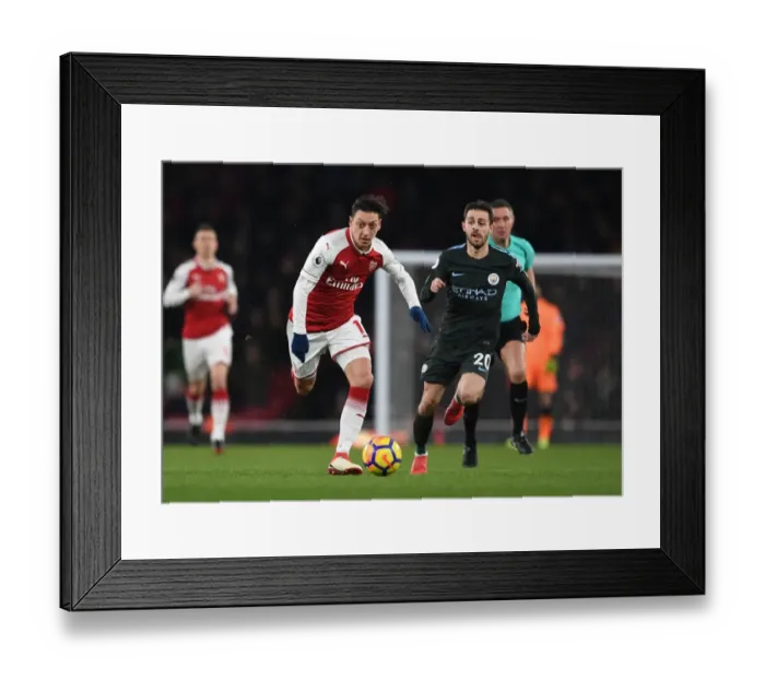 Framed Print : Mesut Ozil vs Bernardo Silva: A Premier League Battle at Arsenal's Emirates Stadium Framed Print : Mesut Ozil vs Bernardo Silva: A Premier League Battle at Arsenal's Emirates Stadium