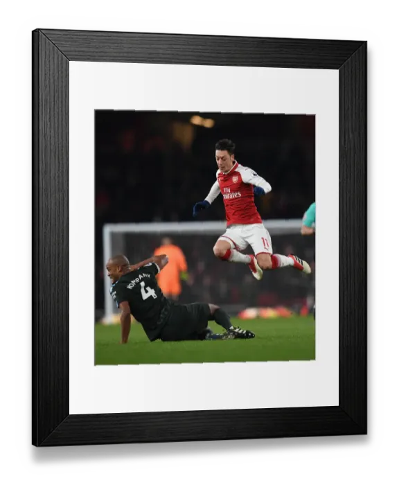Framed Print : Clash of Titans: Ozil vs. Kompany - Arsenal vs. Manchester City, Premier League Framed Print : Clash of Titans: Ozil vs. Kompany - Arsenal vs. Manchester City, Premier League