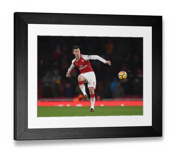 Framed Print : Arsenal's Laurent Koscielny in Action Against Manchester City (2017-18) Framed Print : Arsenal's Laurent Koscielny in Action Against Manchester City (2017-18)