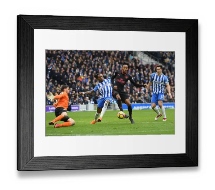Framed Print : Aubameyang vs Bong: Intense Moment from Brighton vs Arsenal Premier League Clash