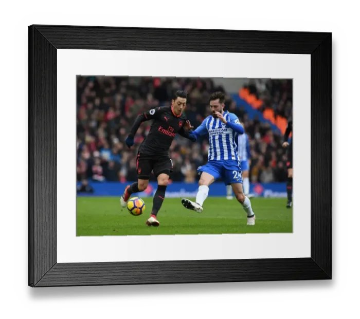Framed Print : Mesut Ozil vs. Davy Propper: Intense Clash in Brighton and Hove Albion vs. Arsenal Premier League Match