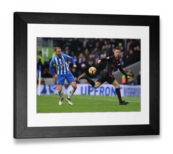 Framed Print : Koscielny vs Murray: A Fierce Battle in the Premier League Clash between Arsenal and Brighton Framed Print : Koscielny vs Murray: A Fierce Battle in the Premier League Clash between Arsenal and Brighton