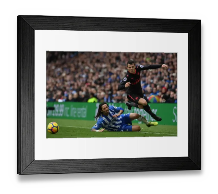 Framed Print : Granit Xhaka Fouled by Ezequiel Schelotto: Brighton vs. Arsenal, Premier League 2018