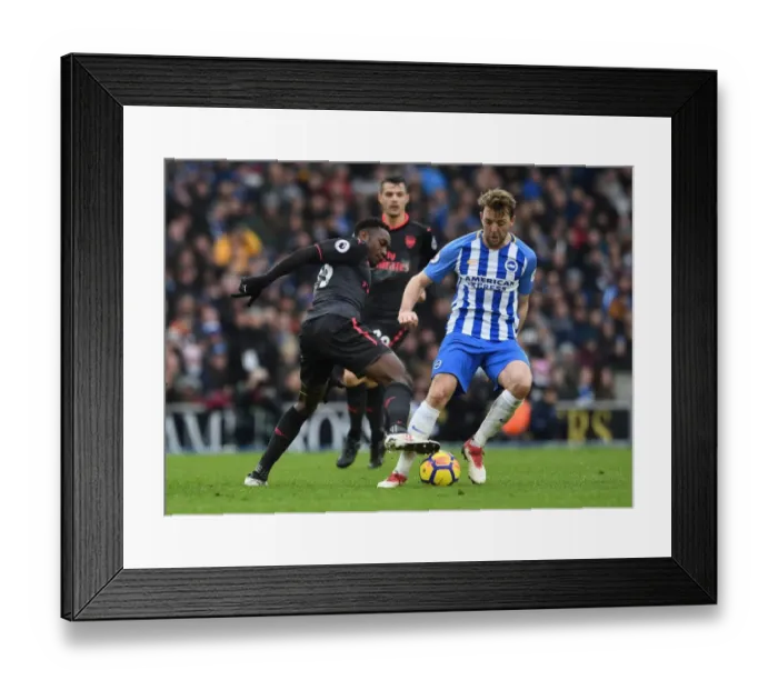 Framed Print : Danny Welbeck vs Dale Stephens: Intense Battle in Brighton and Hove Albion vs Arsenal Premier League Clash