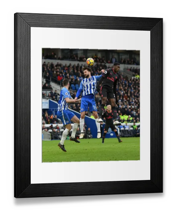 Framed Print : Clash at the Coast: Welbeck vs. Propper in Intense Battle at Brighton-Arsenal Premier League Encounter Framed Print : Clash at the Coast: Welbeck vs. Propper in Intense Battle at Brighton-Arsenal Premier League Encounter