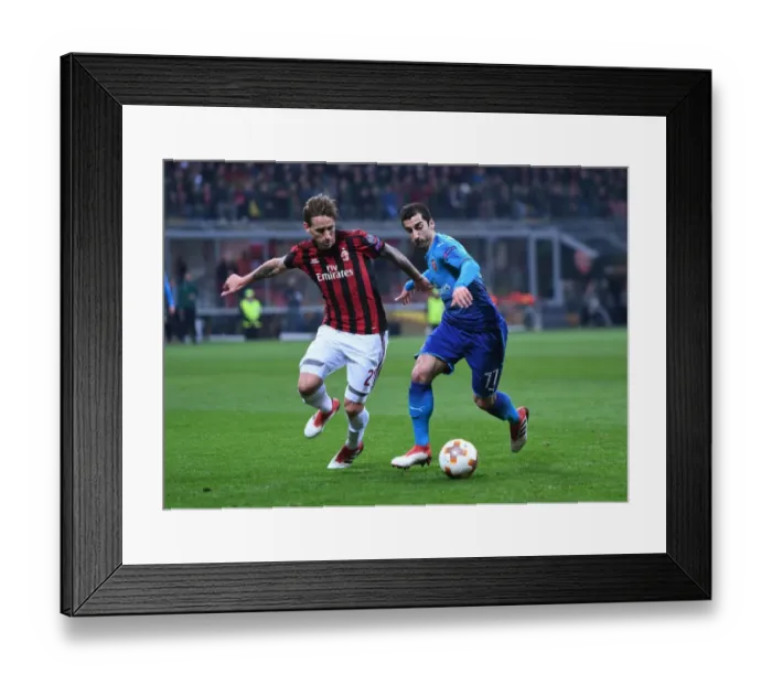 Framed Print : Mkhitaryan vs Biglia: A Europa League Showdown - Arsenal vs AC Milan Framed Print : Mkhitaryan vs Biglia: A Europa League Showdown - Arsenal vs AC Milan