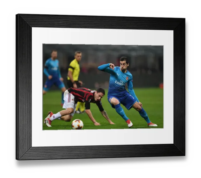 Framed Print : Mkhitaryan Dances Past Calabria: Arsenal vs. AC Milan, UEFA Europa League Round of 16