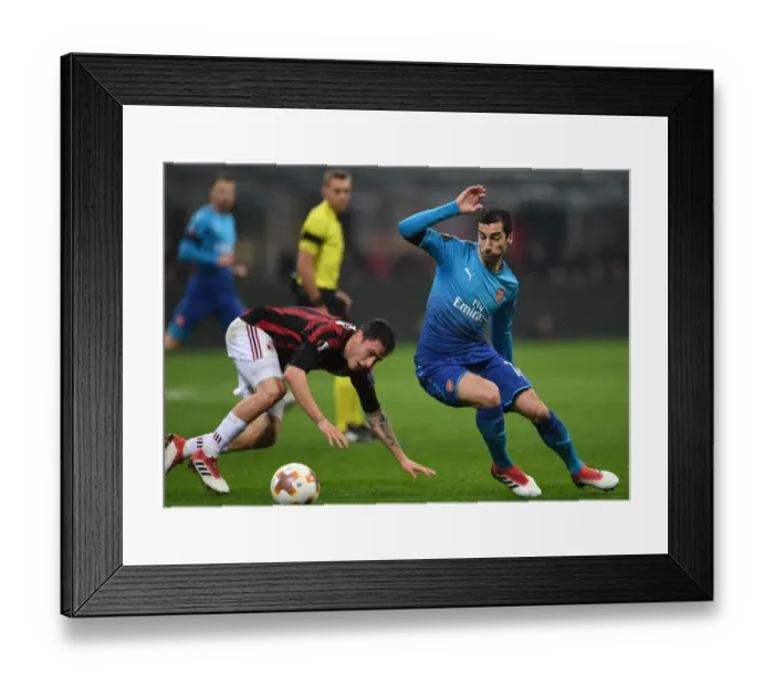 Framed Print : Mkhitaryan Dances Past Calabria: Arsenal vs AC Milan, UEFA Europa League Round of 16