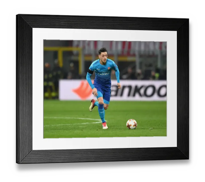 Framed Print : Mesut Ozil in Action: Arsenal vs. AC Milan, UEFA Europa League (First Leg)