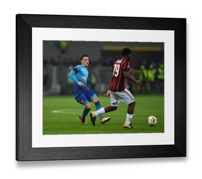 Framed Print : Mesut Ozil vs. Franck Kessie: Battle in the Midfield - Arsenal vs. AC Milan, UEFA Europa League Framed Print : Mesut Ozil vs. Franck Kessie: Battle in the Midfield - Arsenal vs. AC Milan, UEFA Europa League