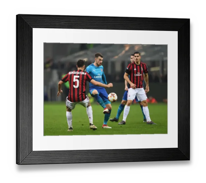 Framed Print : Aaron Ramsey vs. Giacomo Bonaventura: Battle in the Europa League - Arsenal vs. AC Milan