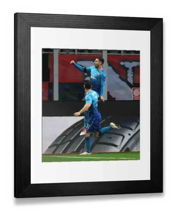 Framed Print : Arsenal's Ramsey and Kolasinac Celebrate Europa League Goals Against AC Milan