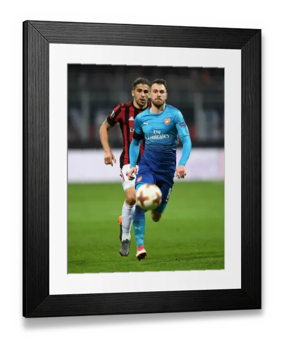 Framed Print : Ramsey Chased by Rodriguez: Intense Moment from AC Milan vs. Arsenal Europa League Clash Framed Print : Ramsey Chased by Rodriguez: Intense Moment from AC Milan vs. Arsenal Europa League Clash