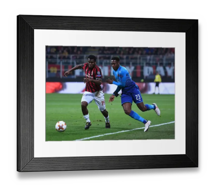 Framed Print : Clash of Stars: Welbeck vs. Kessie in AC Milan vs. Arsenal UEFA Europa League Showdown Framed Print : Clash of Stars: Welbeck vs. Kessie in AC Milan vs. Arsenal UEFA Europa League Showdown
