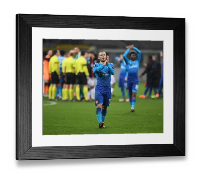 Framed Print : Jack Wilshere's Triumphant Return: Celebrating with Arsenal Fans after Europa League Victory over AC Milan