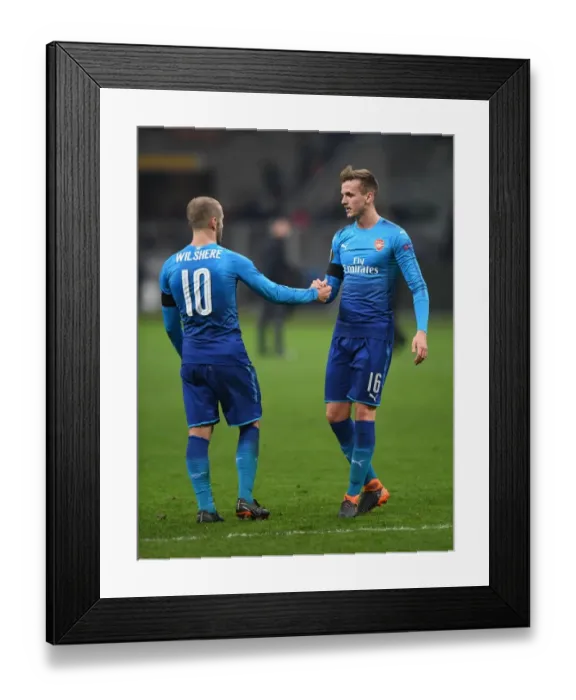Framed Print : Arsenal's Holding and Wilshere Share a Moment after AC Milan Clash in Europa League Framed Print : Arsenal's Holding and Wilshere Share a Moment after AC Milan Clash in Europa League