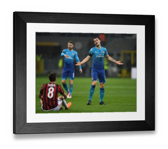 Framed Print : Xhaka vs. Suso: Intense Rivalry in Arsenal's Europa League Clash with AC Milan Framed Print : Xhaka vs. Suso: Intense Rivalry in Arsenal's Europa League Clash with AC Milan