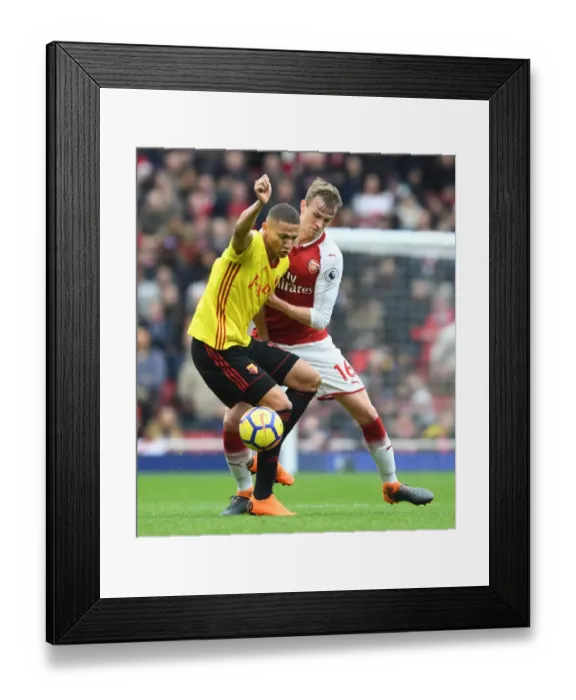 Framed Print : Clash at the Emirates: Holding vs. Richarlison - Arsenal vs. Watford, Premier League Framed Print : Clash at the Emirates: Holding vs. Richarlison - Arsenal vs. Watford, Premier League