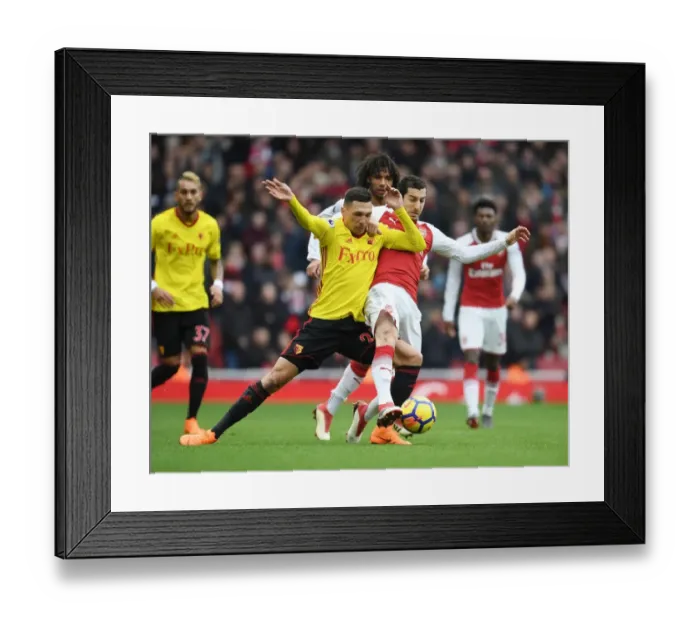 Framed Print : Mkhitaryan vs Holebas: Intense Battle in Arsenal vs Watford Premier League Clash Framed Print : Mkhitaryan vs Holebas: Intense Battle in Arsenal vs Watford Premier League Clash