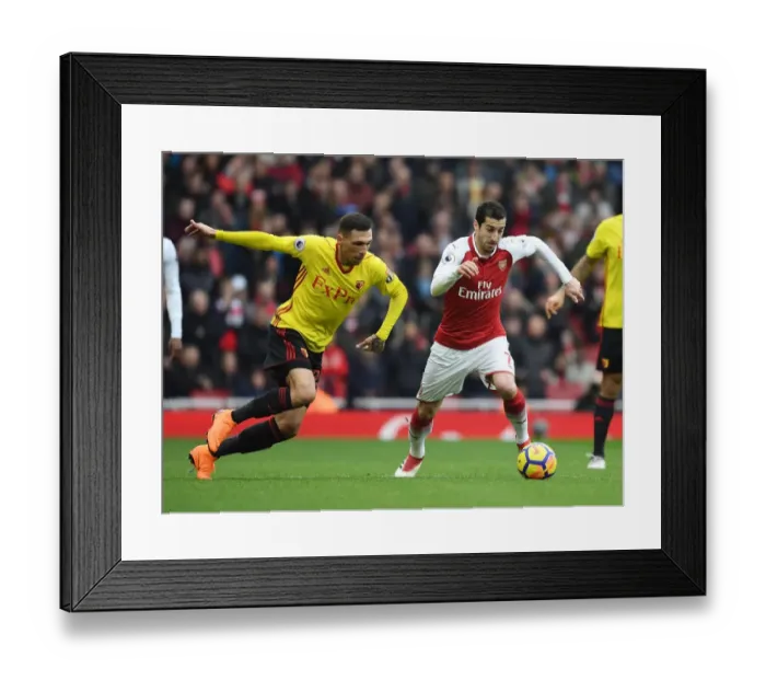 Framed Print : Clash at the Emirates: Mkhitaryan vs Holebas in Arsenal's Battle against Watford
