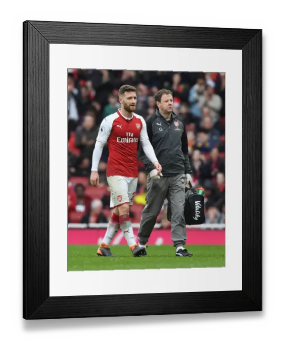 Framed Print : Arsenal's Colin Lewin Tends to Injured Shkodran Mustafi vs. Watford (2017-18)