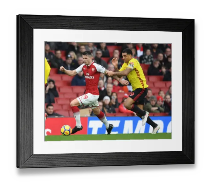 Framed Print : Clash of Leaders: Xhaka vs. Deeney - Arsenal vs. Watford, Premier League