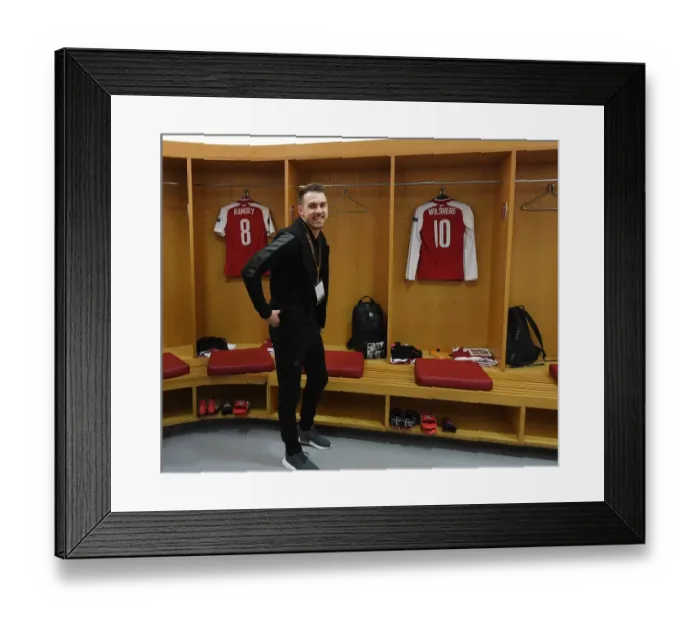 Framed Print : Aaron Ramsey in Arsenal Changing Room Before Arsenal v AC Milan UEFA Europa League Match