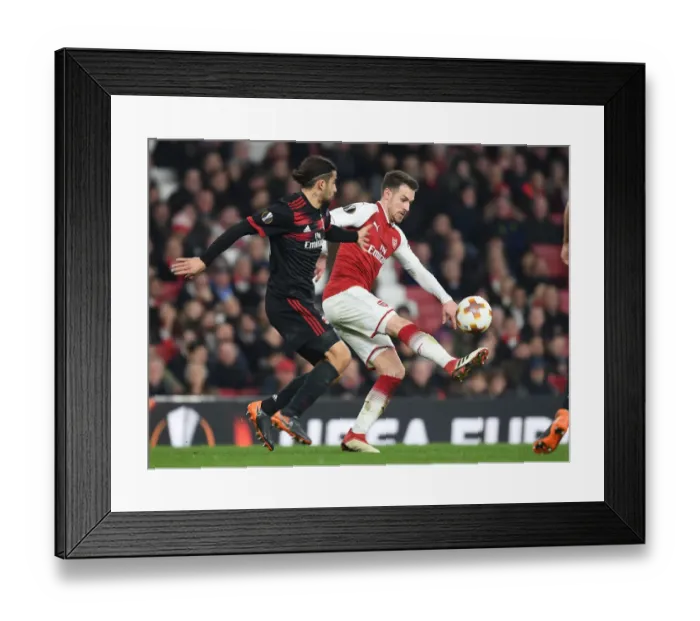 Framed Print : Clash of Stars: Ramsey vs. Rodriguez in Arsenal vs. AC Milan Europa League Showdown Framed Print : Clash of Stars: Ramsey vs. Rodriguez in Arsenal vs. AC Milan Europa League Showdown