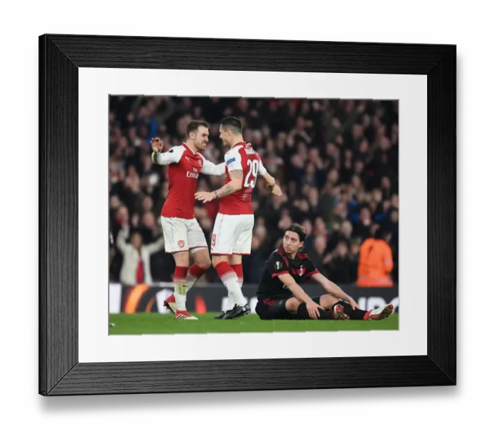 Framed Print : Xhaka and Ramsey Celebrate Arsenal's Goals Against AC Milan in Europa League Clash Framed Print : Xhaka and Ramsey Celebrate Arsenal's Goals Against AC Milan in Europa League Clash