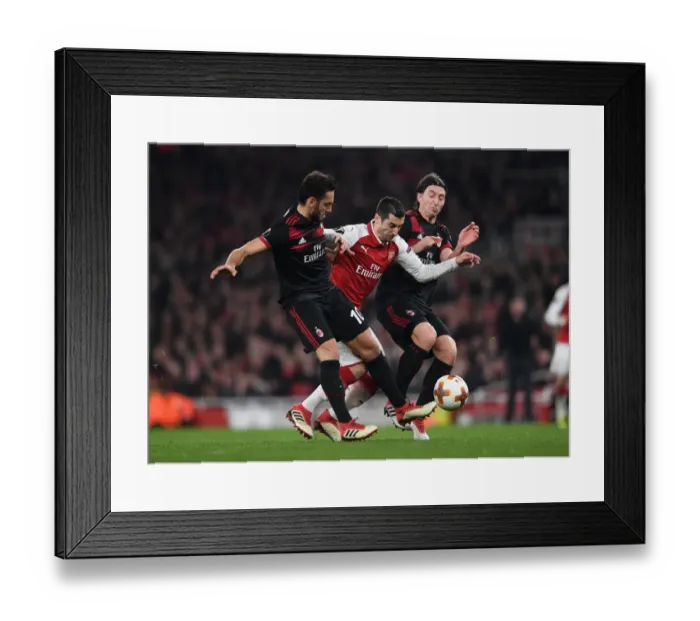 Framed Print : Arsenal's Mkhitaryan Faces Off Against Calhanoglu and Montolivo in Intense Europa League Clash
