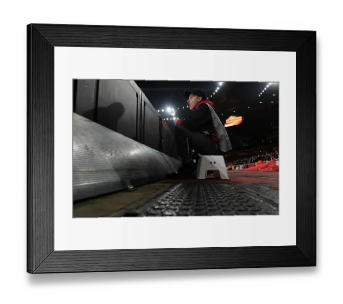 Framed Print : Arsenal Ballboy: Behind the Scenes at the Emirates during Arsenal vs. AC Milan Europa League Match Framed Print : Arsenal Ballboy: Behind the Scenes at the Emirates during Arsenal vs. AC Milan Europa League Match