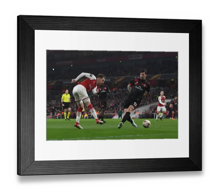 Framed Print : Aaron Ramsey vs Alessio Romagnoli: Tense Moment at the Emirates - Arsenal vs AC Milan, UEFA Europa League 2018 Framed Print : Aaron Ramsey vs Alessio Romagnoli: Tense Moment at the Emirates - Arsenal vs AC Milan, UEFA Europa League 2018