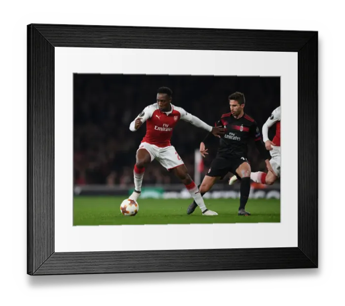 Framed Print : Arsenal's Danny Welbeck Faces Off Against AC Milan's Fabio Borini in Europa League Clash Framed Print : Arsenal's Danny Welbeck Faces Off Against AC Milan's Fabio Borini in Europa League Clash