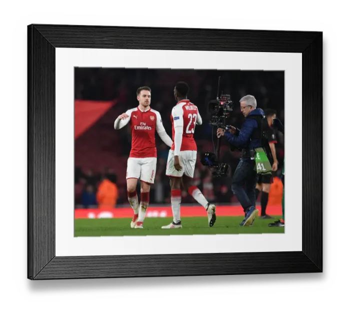 Framed Print : Arsenal's Ramsey and Welbeck Celebrate after Europa League Clash against AC Milan Framed Print : Arsenal's Ramsey and Welbeck Celebrate after Europa League Clash against AC Milan
