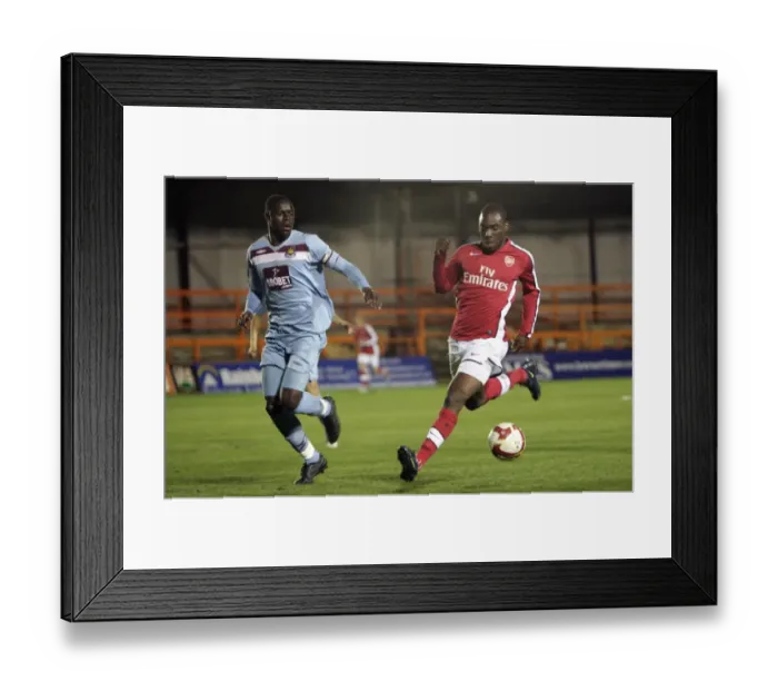 Framed Print : Gilles Sunu (Arsenal) Bondz N Gala (West Ham)