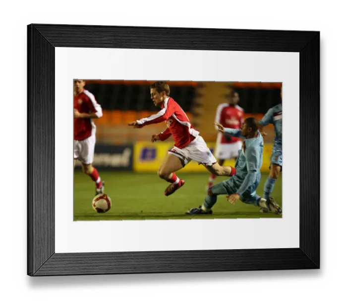 Framed Print : Jack Wilshere (Arsenal) Ashley Miller (West Ham) Framed Print : Jack Wilshere (Arsenal) Ashley Miller (West Ham)