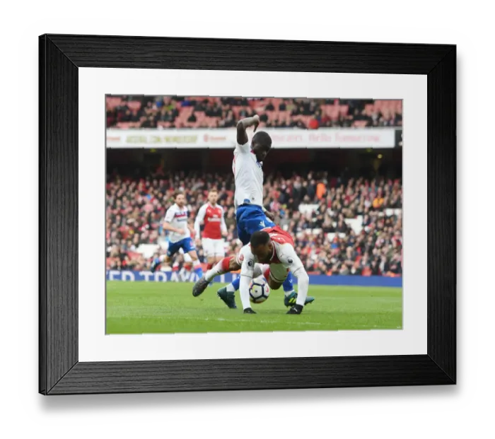 Framed Print : Controversial Penalty: Lacazette Tripped by Ndiaye in Arsenal's Win over Stoke City Framed Print : Controversial Penalty: Lacazette Tripped by Ndiaye in Arsenal's Win over Stoke City