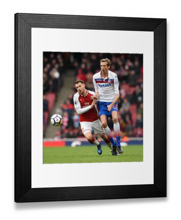 Framed Print : Clash at the Emirates: Ramsey vs. Crouch in Arsenal's Battle Against Stoke City (April 2018) Framed Print : Clash at the Emirates: Ramsey vs. Crouch in Arsenal's Battle Against Stoke City (April 2018)