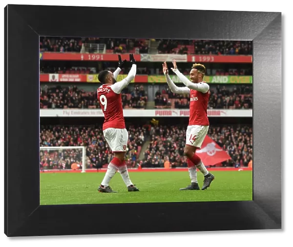 Arsenal Double Trouble: Aubameyang and Lacazette Celebrate Goals Against Stoke City