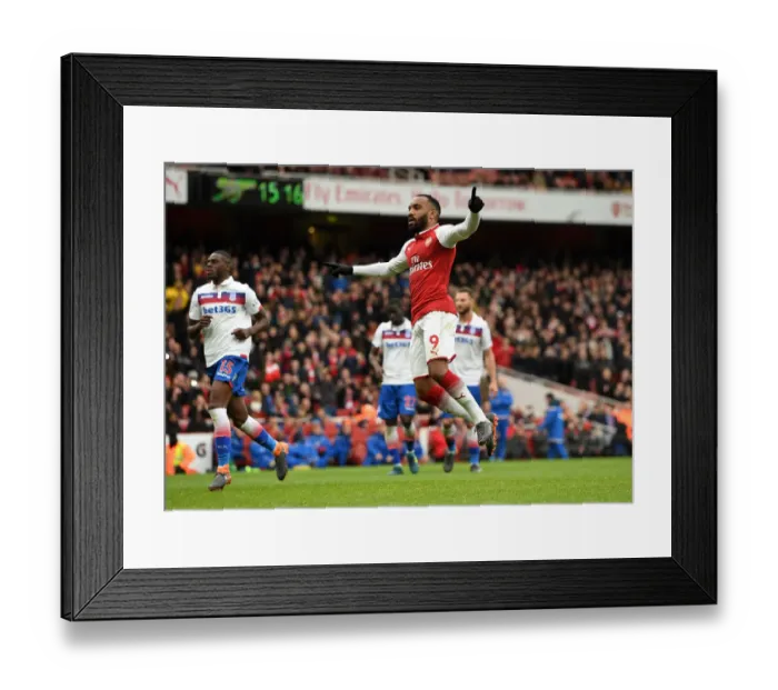 Framed Print : Alexandre Lacazette's Hat-Trick: Arsenal Crush Stoke City in Premier League