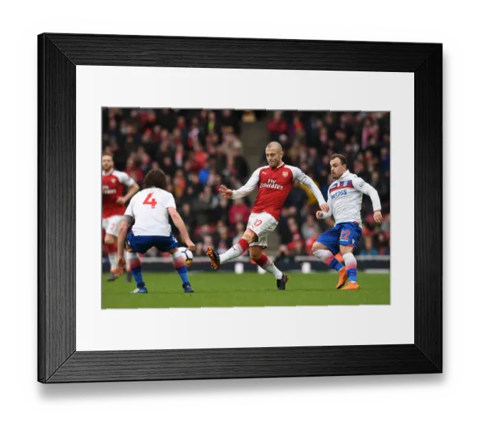 Framed Print : Wilshere vs Shaqiri: Intense Battle at Emirates Stadium - Arsenal v Stoke City, Premier League