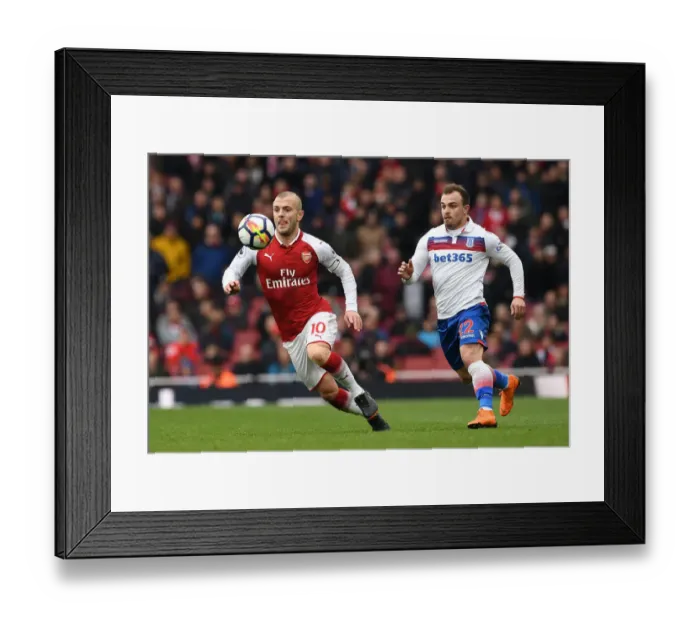 Framed Print : Intense Rivalry: Wilshere vs. Shaqiri - Arsenal's Battle Against Stoke Framed Print : Intense Rivalry: Wilshere vs. Shaqiri - Arsenal's Battle Against Stoke
