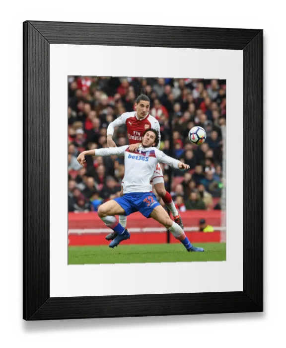 Framed Print : Clash at the Emirates: Bellerin vs. Sobhi in Arsenal's Battle Against Stoke City Framed Print : Clash at the Emirates: Bellerin vs. Sobhi in Arsenal's Battle Against Stoke City