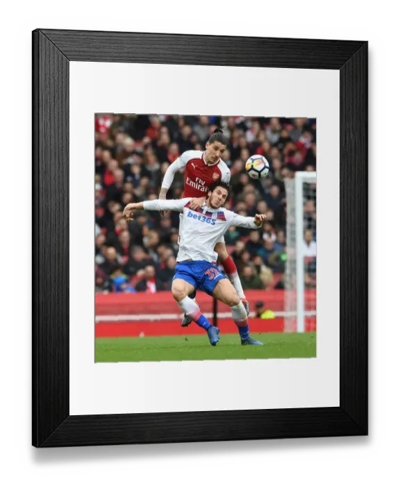 Framed Print : Bellerin vs. Sobhi: A Battle at the Emirates - Arsenal's Clash with Stoke City