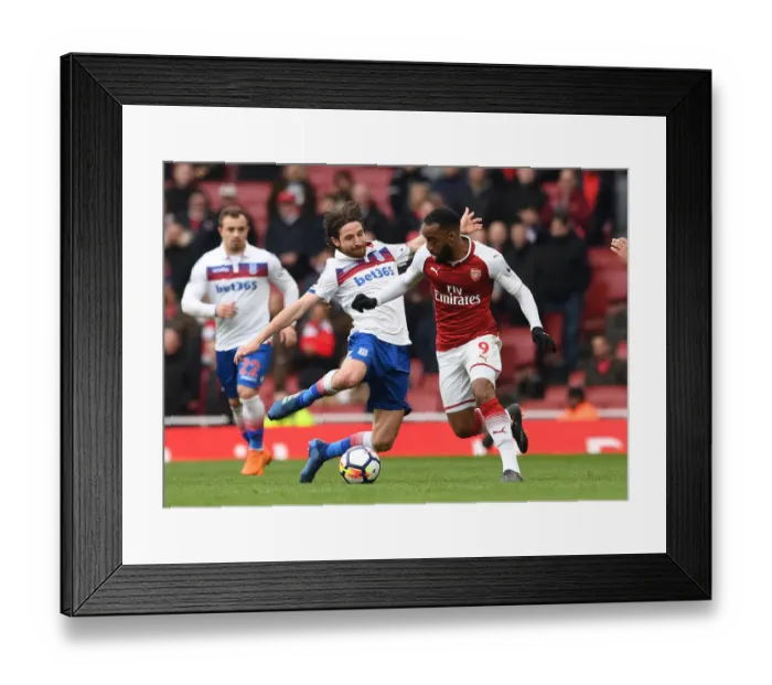 Framed Print : Clash at the Emirates: Lacazette vs. Allen - Arsenal vs. Stoke City, Premier League