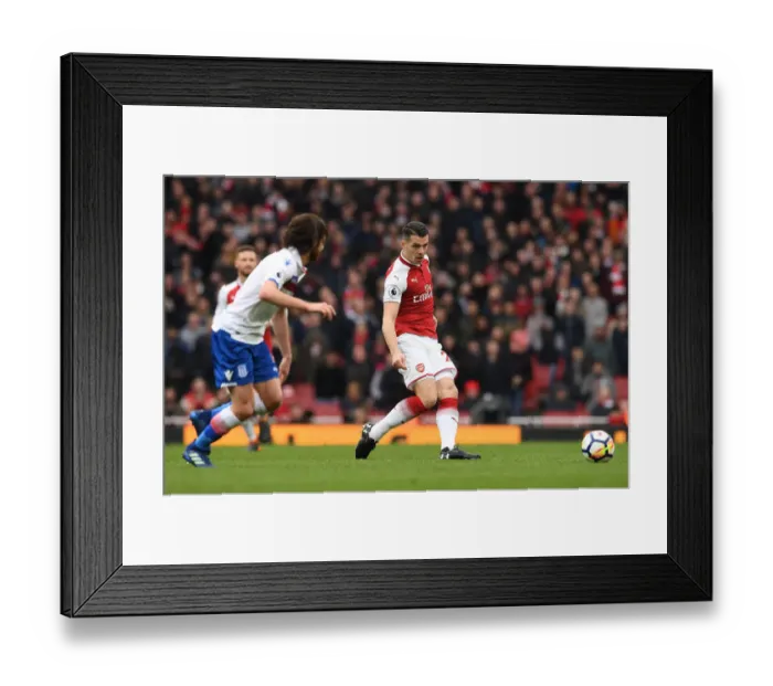 Framed Print : Granit Xhaka: Arsenal Midfielder in Action against Stoke City, Premier League 2017-18 Framed Print : Granit Xhaka: Arsenal Midfielder in Action against Stoke City, Premier League 2017-18
